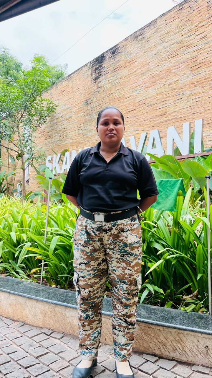 RSFM lady security guard standing on duty at a residential site