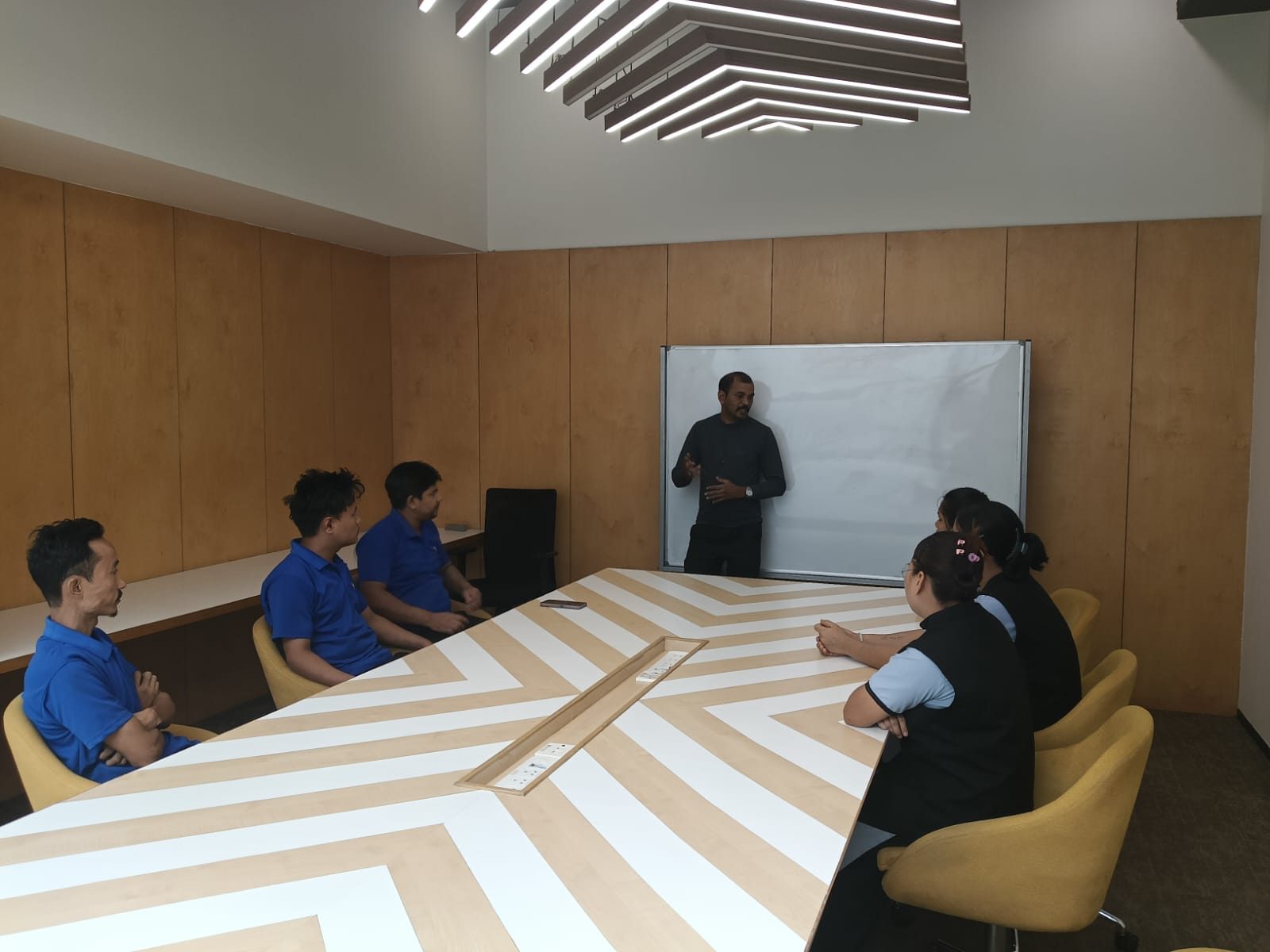 RSFM housekeeping and security team briefing in a meeting room